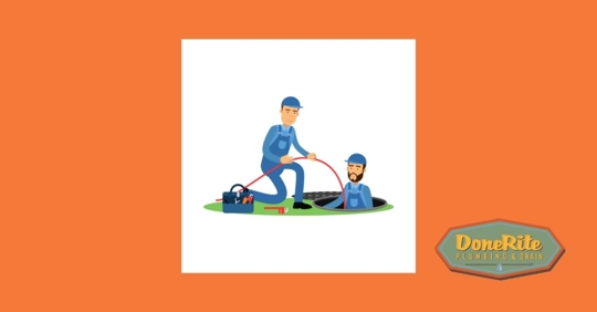 Two plumbers cleaning a sewer.